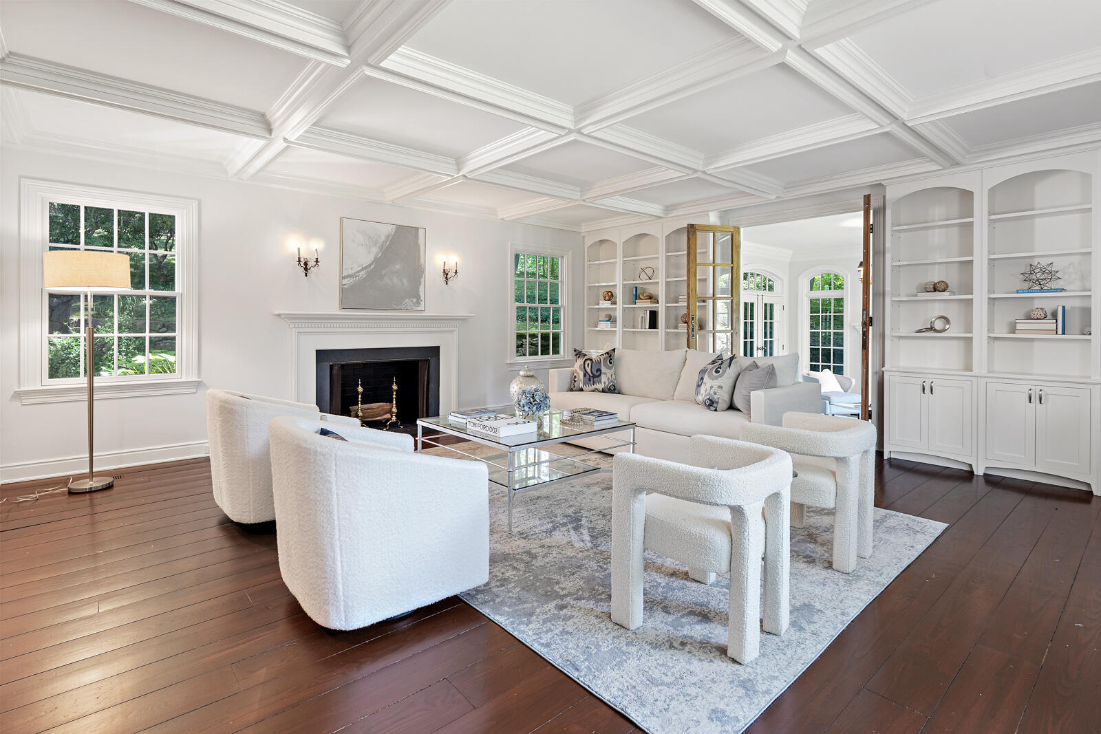 1446 Ponus Ridge Road New Canaan, CT 06840 - Photo 8 of 25 a living room with furniture a fireplace and a wooden floor