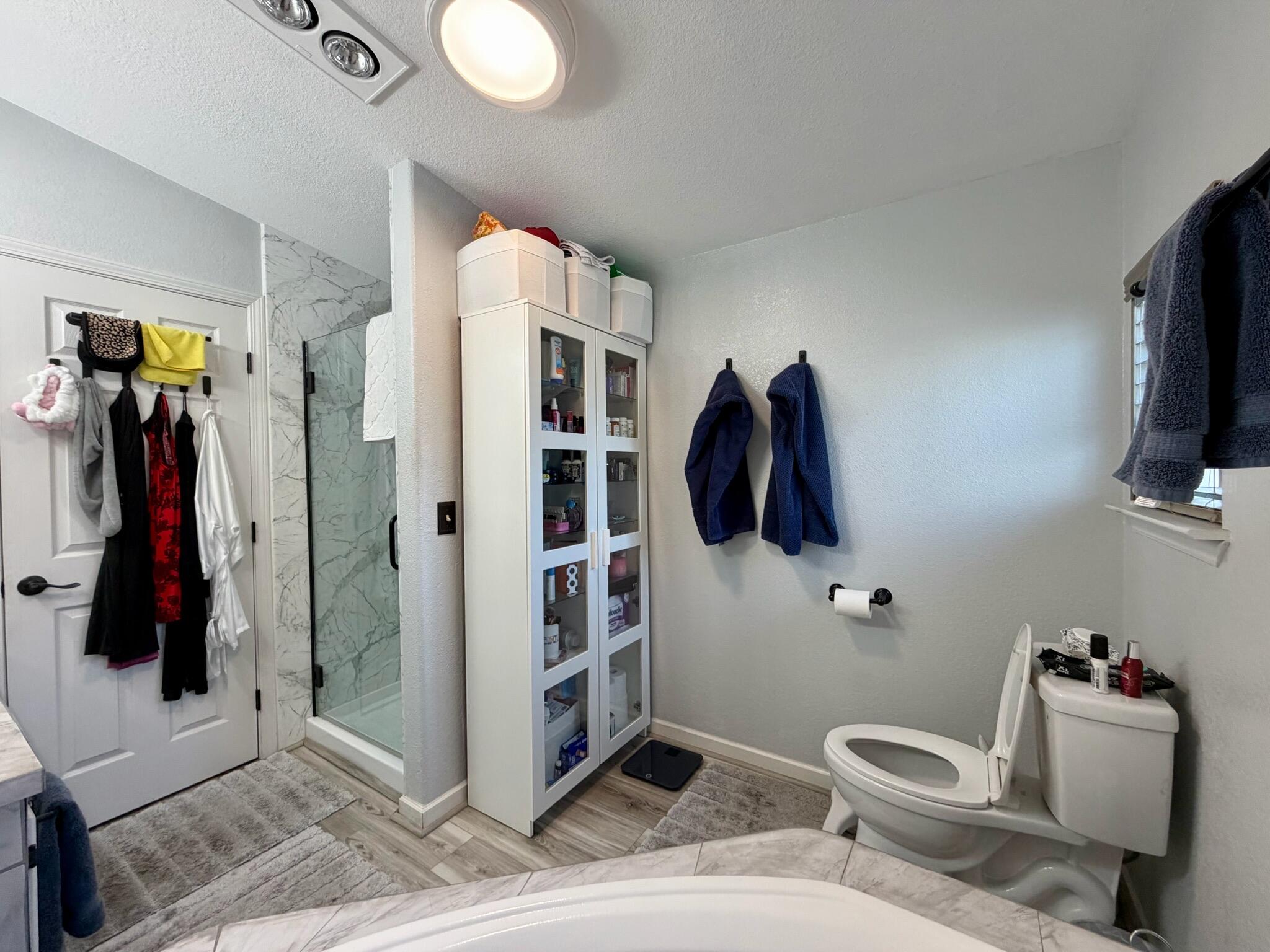 9080 Bloomfield Street, Unit 270 Cypress, CA 90630 - Photo 19 of 34 a bathroom with a shower