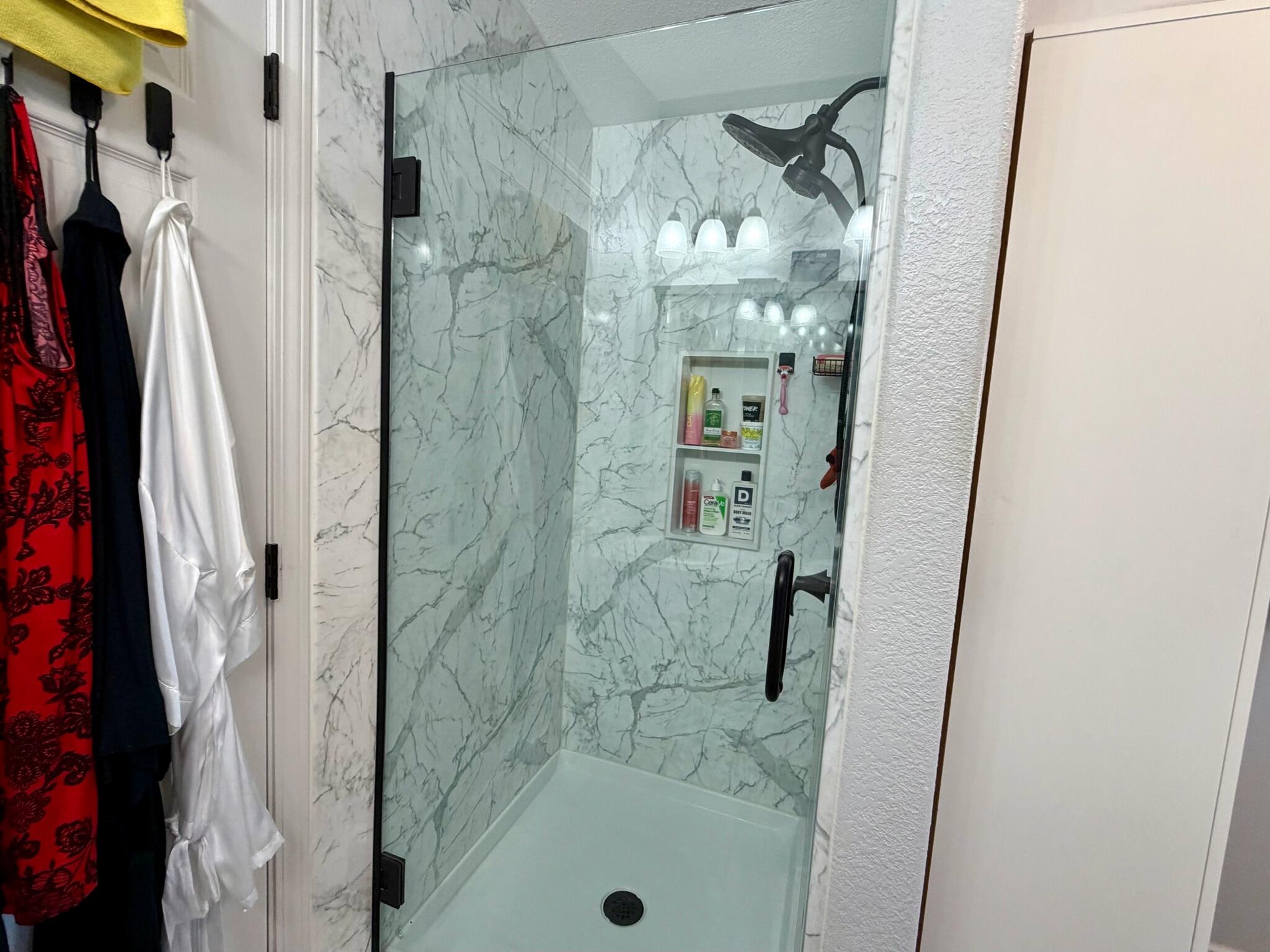 9080 Bloomfield Street, Unit 270 Cypress, CA 90630 - Photo 20 of 34 a bathroom with a shower