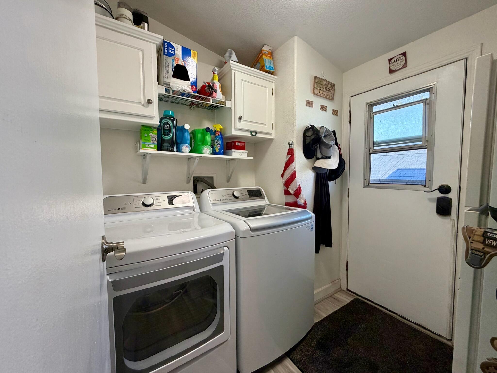 9080 Bloomfield Street, Unit 270 Cypress, CA 90630 - Photo 28 of 34 a utility room with dryer and washer