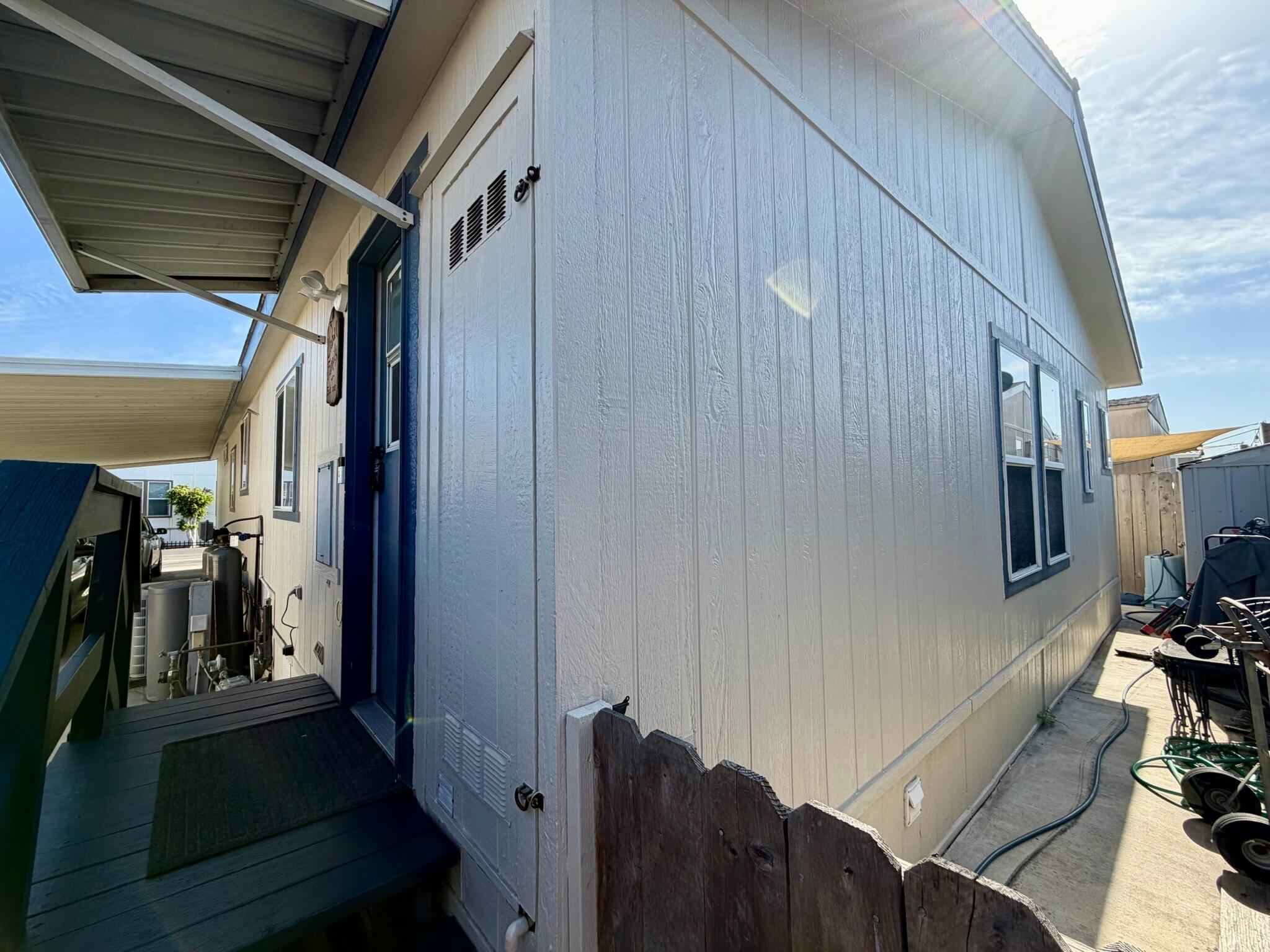 9080 Bloomfield Street, Unit 270 Cypress, CA 90630 - Photo 29 of 34 a view of a hallway with wooden floor and stairs