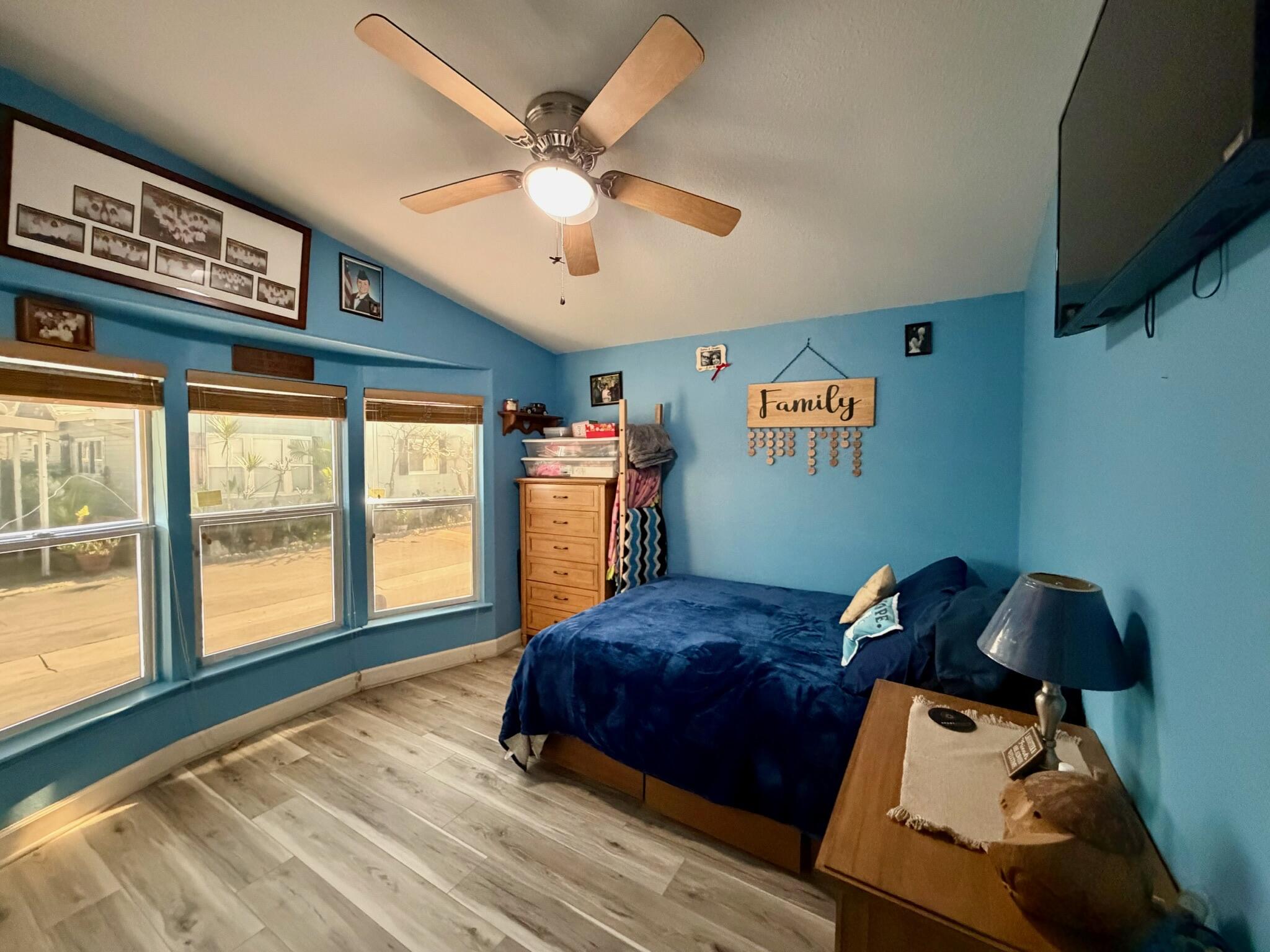 9080 Bloomfield Street, Unit 270 Cypress, CA 90630 - Photo 8 of 34 a bedroom with furniture and a large window