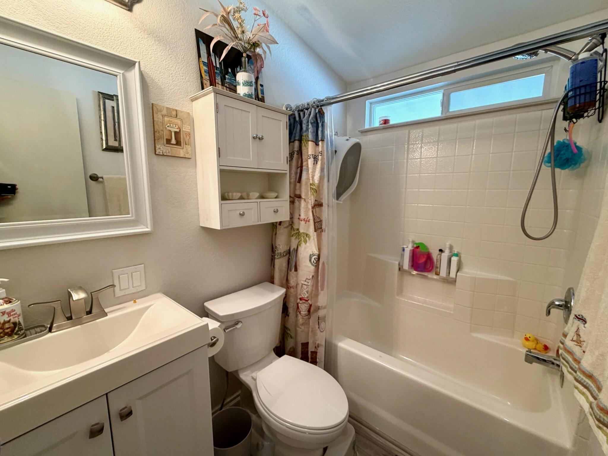 9080 Bloomfield Street, Unit 270 Cypress, CA 90630 - Photo 10 of 34 a bathroom with a sink toilet and shower
