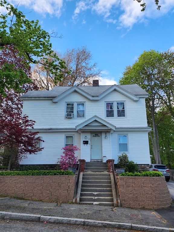 2 Thayer Street Worcester, MA 01603 - Photo 1 of 33 a front view of a house with garage