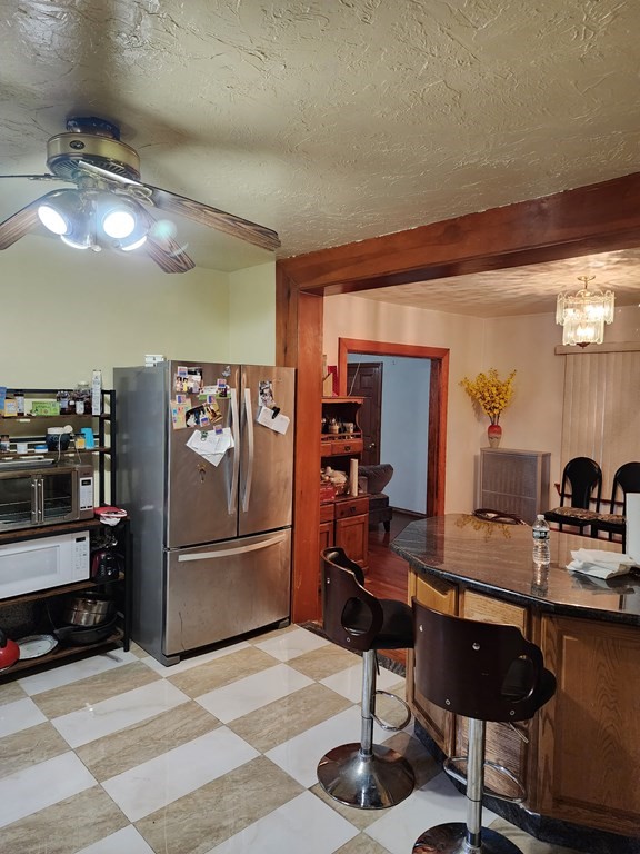 2 Thayer Street Worcester, MA 01603 - Photo 13 of 33 a room with furniture and view kitchen