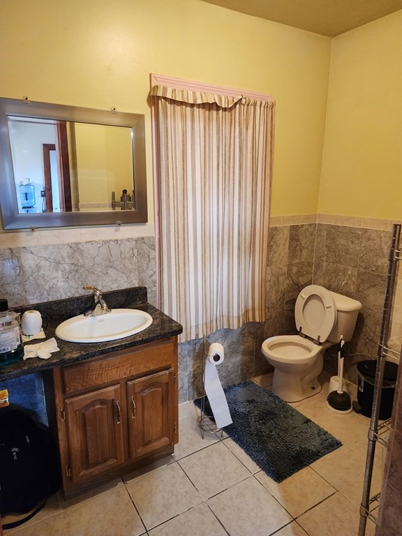 2 Thayer Street Worcester, MA 01603 - Photo 16 of 33 a bathroom with a sink toilet and shower