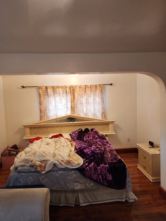 2 Thayer Street Worcester, MA 01603 - Photo 19 of 33 a bedroom with a bed and a window