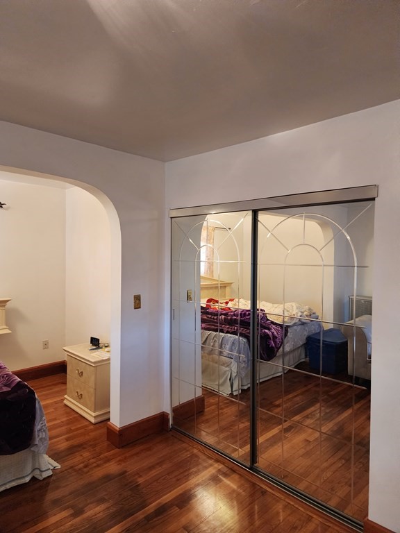 2 Thayer Street Worcester, MA 01603 - Photo 20 of 33 a living room with hardwood floor and furniture