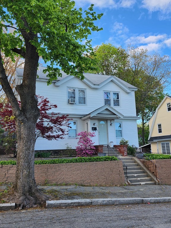2 Thayer Street Worcester, MA 01603 - Photo 2 of 33 front view of house with a tree