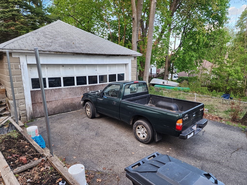2 Thayer Street Worcester, MA 01603 - Photo 27 of 33 a car parked in front of a house