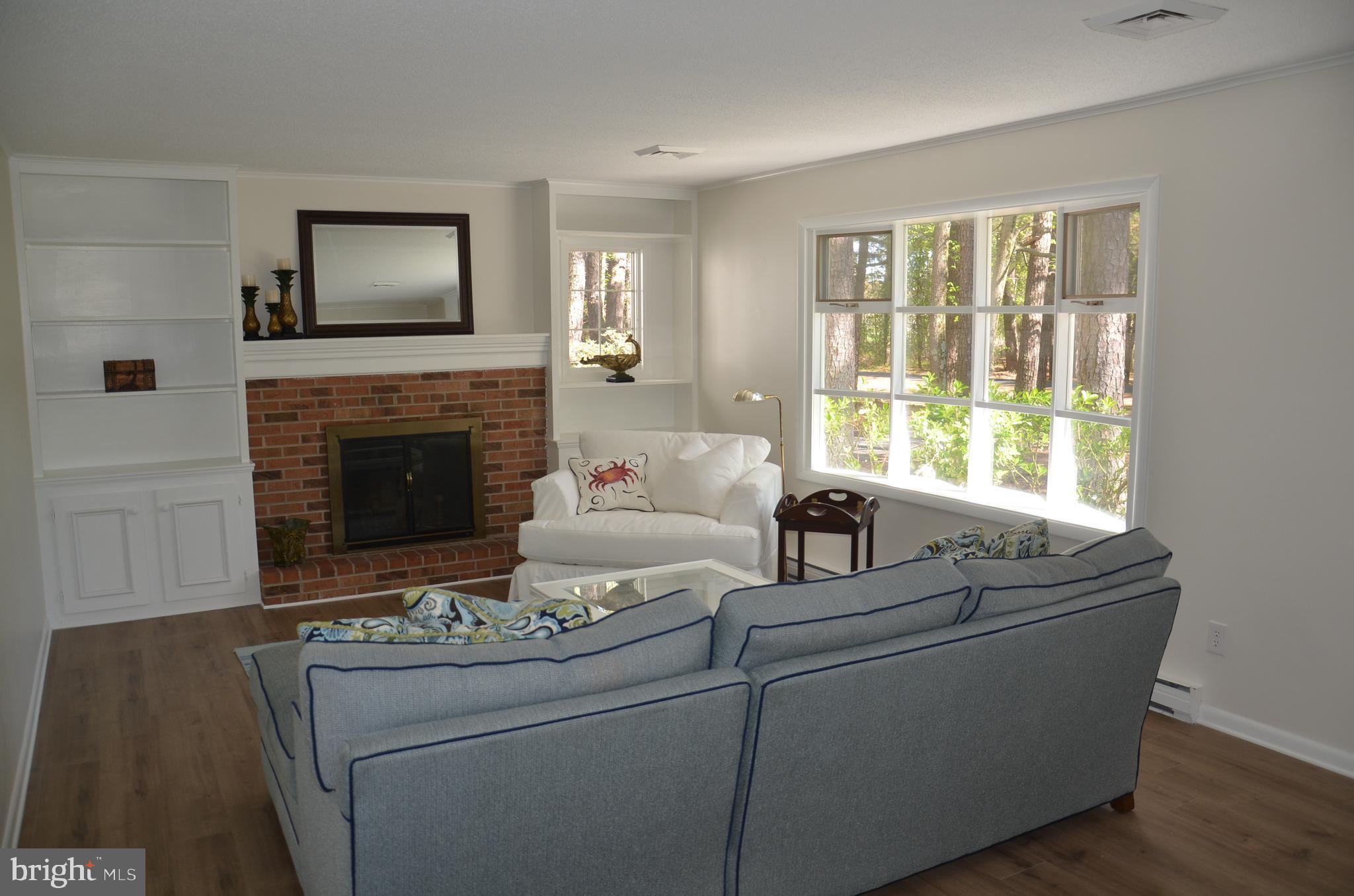 23266 Mallard Point Road McDaniel, MD 21647 - Photo 4 of 23 Living Room w/brick fireplace