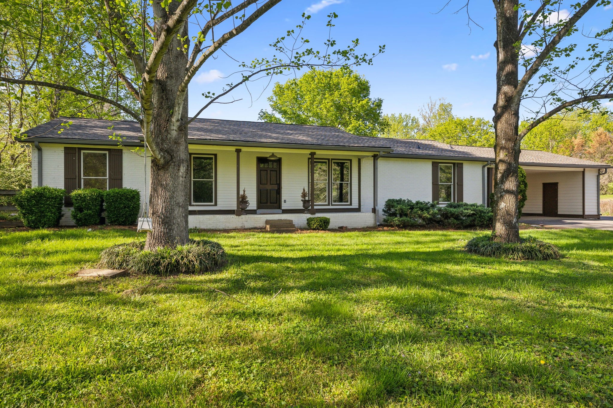 4462 Harpeth School Road Franklin, TN 37064 - Photo 1 of 45 a front view of house with yard and green space