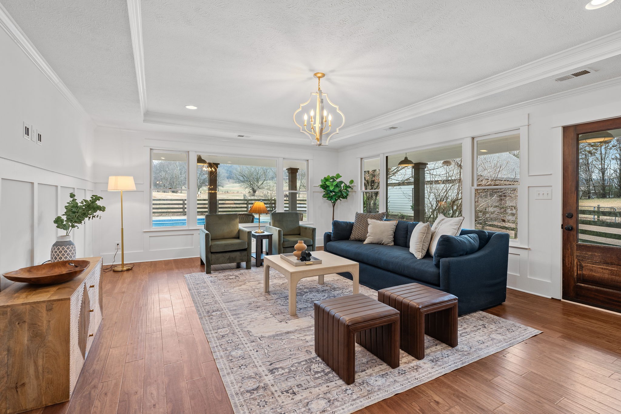 4462 Harpeth School Road Franklin, TN 37064 - Photo 20 of 45 a living room with furniture and a chandelier