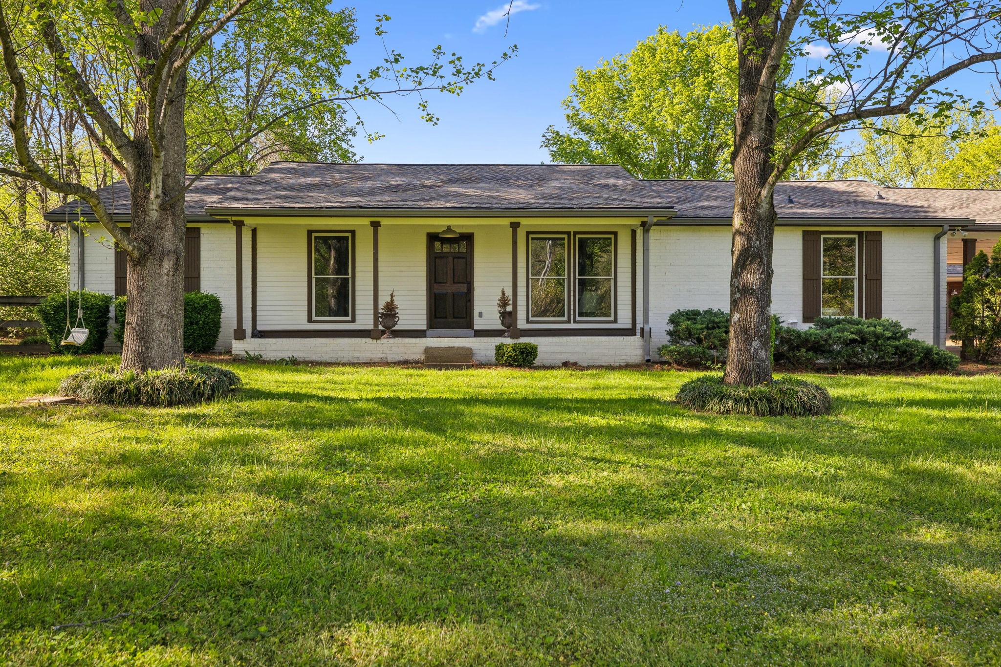 4462 Harpeth School Road Franklin, TN 37064 - Photo 2 of 45 a front view of a house with a yard