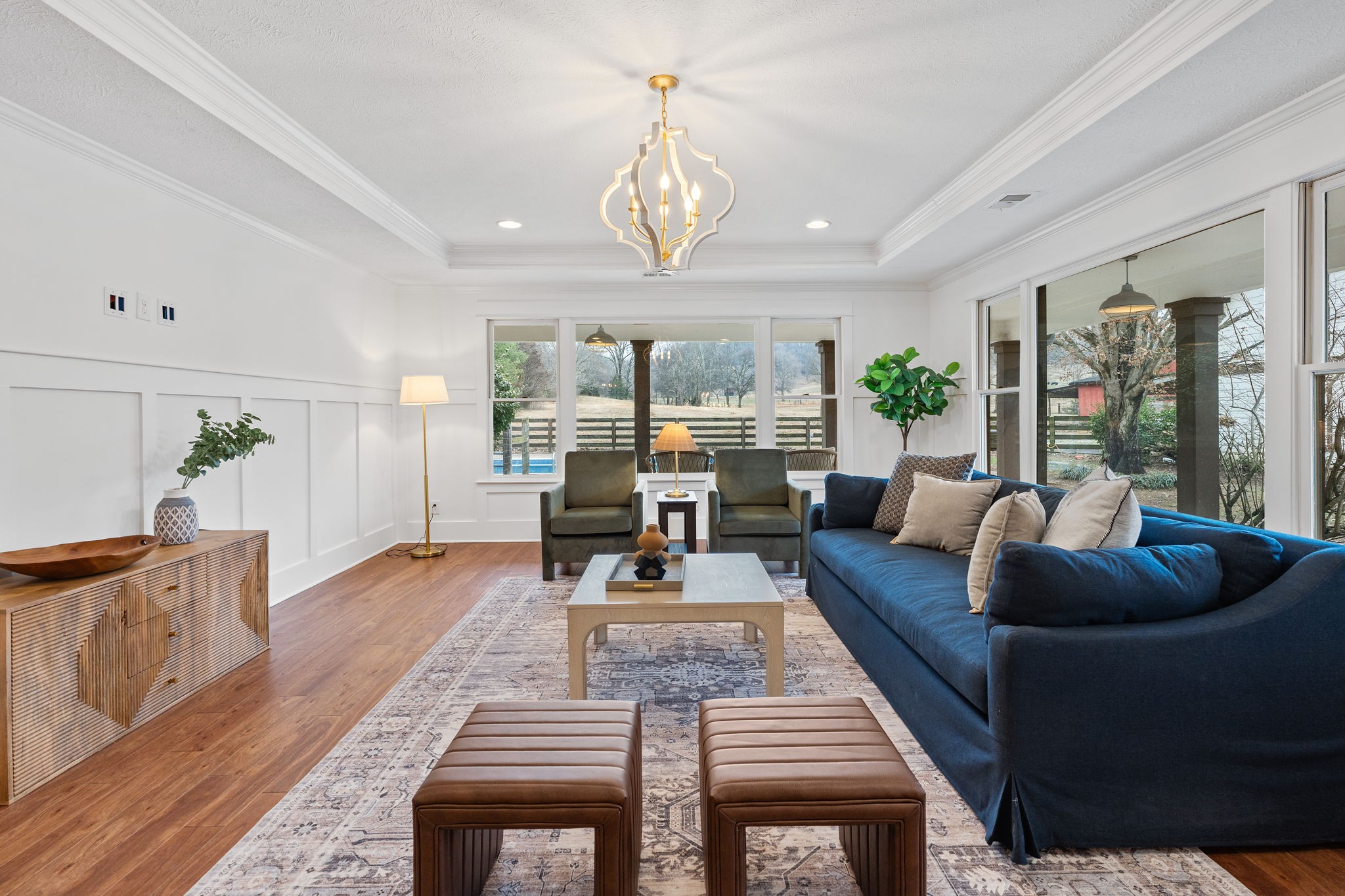 4462 Harpeth School Road Franklin, TN 37064 - Photo 21 of 45 a living room with furniture and a chandelier
