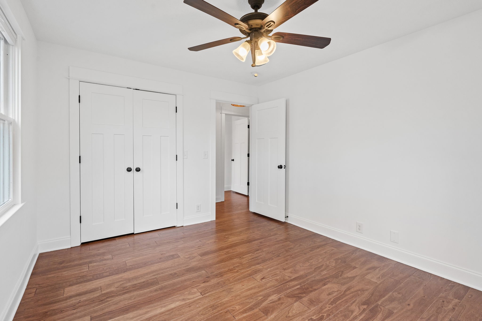 4462 Harpeth School Road Franklin, TN 37064 - Photo 22 of 45 a view of an empty room with wooden floor