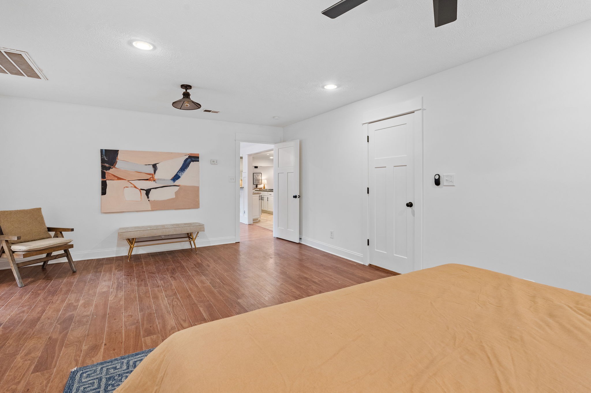 4462 Harpeth School Road Franklin, TN 37064 - Photo 24 of 45 a bedroom with a bed and a chair