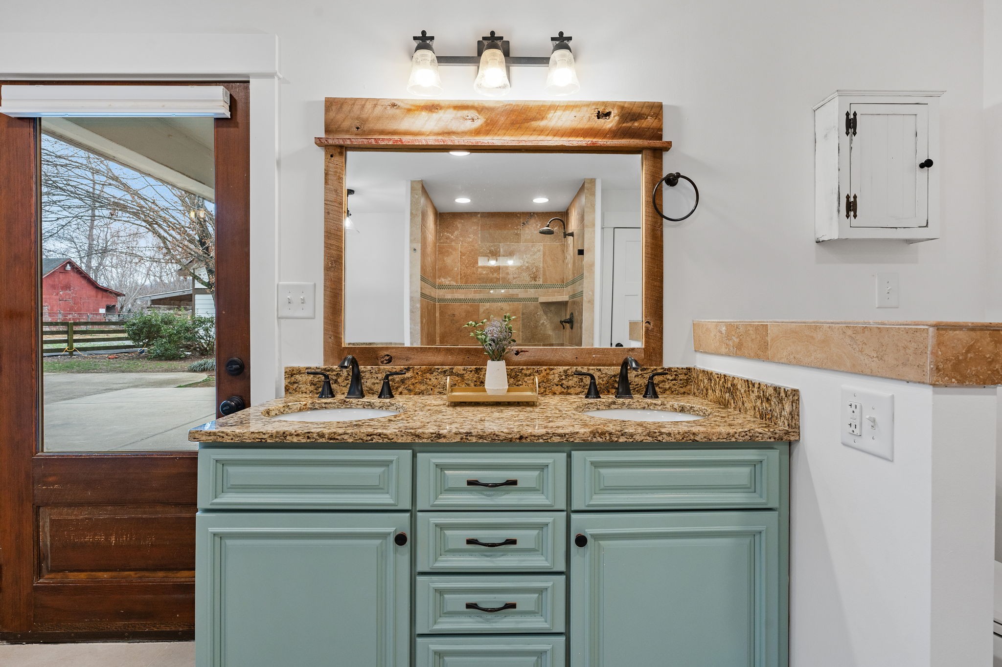 4462 Harpeth School Road Franklin, TN 37064 - Photo 25 of 45 a bathroom with a sink and a mirror