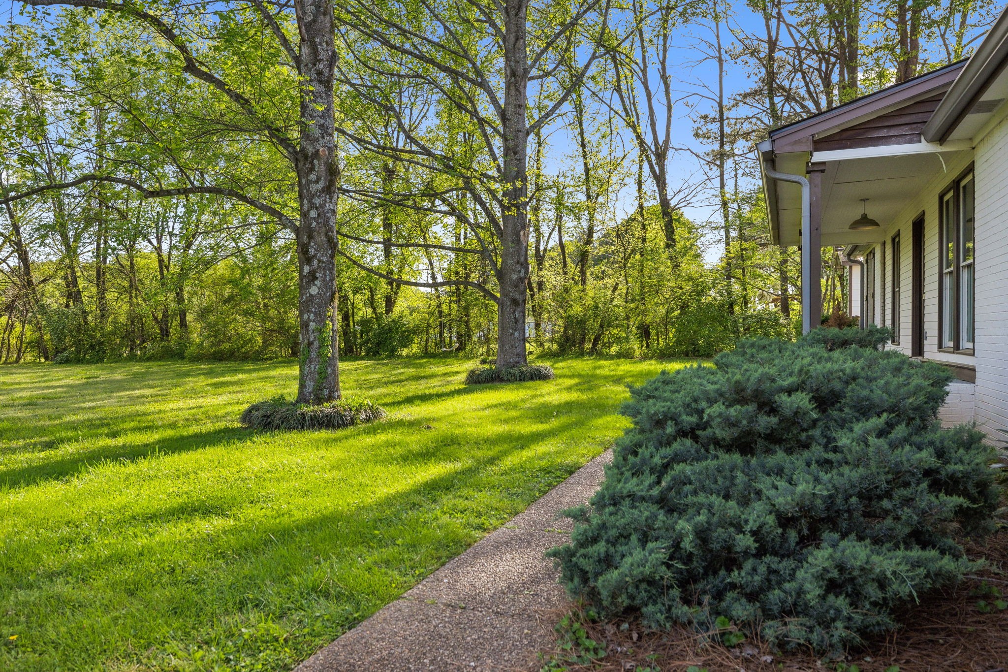 4462 Harpeth School Road Franklin, TN 37064 - Photo 5 of 45 a view of a fountain in front of a house
