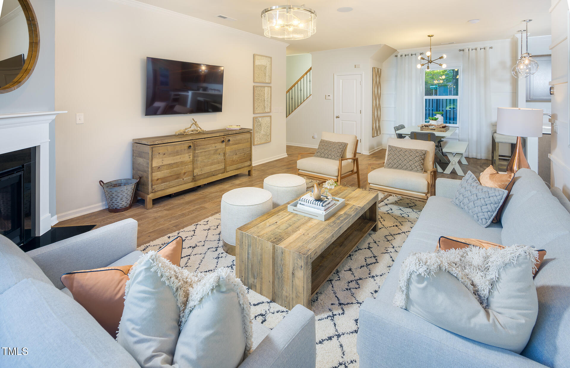 1011 Freestone Road Durham, NC 27703 - Photo 9 of 20 a living room with furniture and a flat screen tv