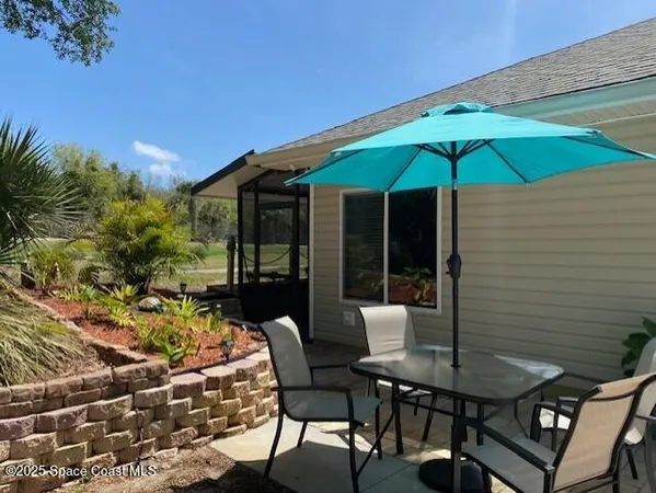a view of a yard with an outdoor space