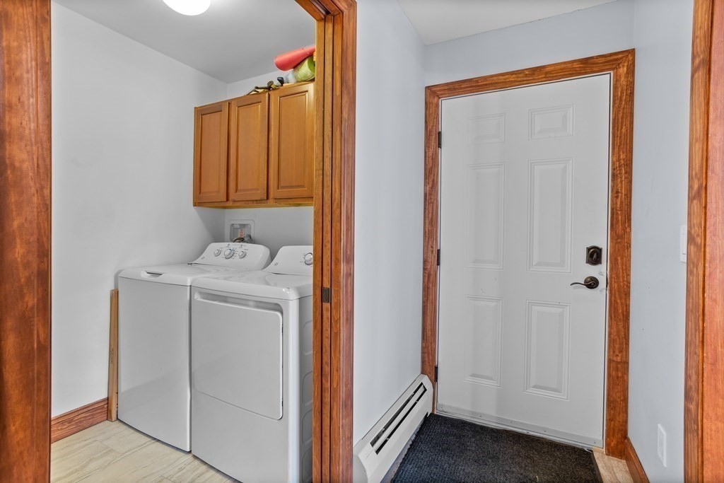 277 Sawyer Road Bolton, MA 01740 - Photo 23 of 41 a utility room with dryer and washer