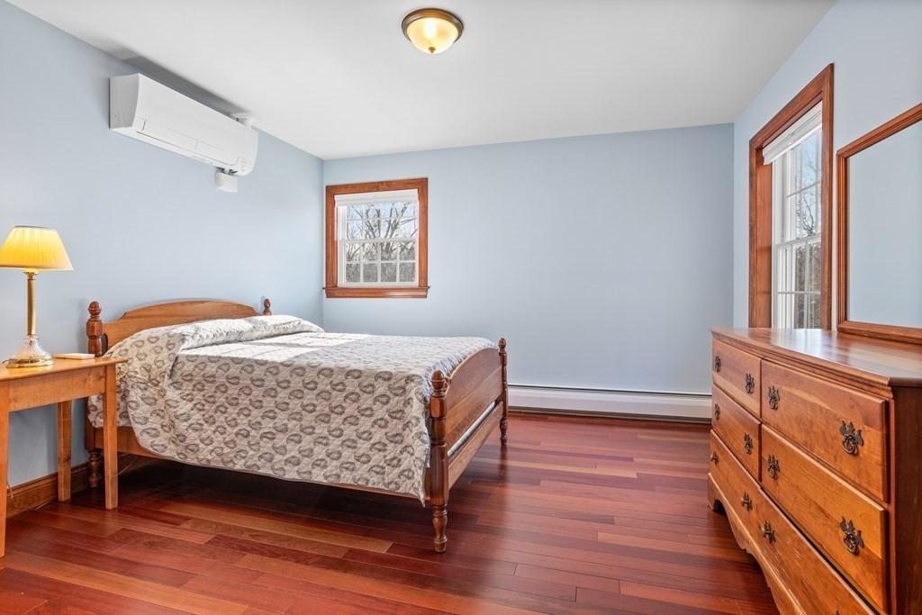 277 Sawyer Road Bolton, MA 01740 - Photo 25 of 41 a bedroom with a bed and a window