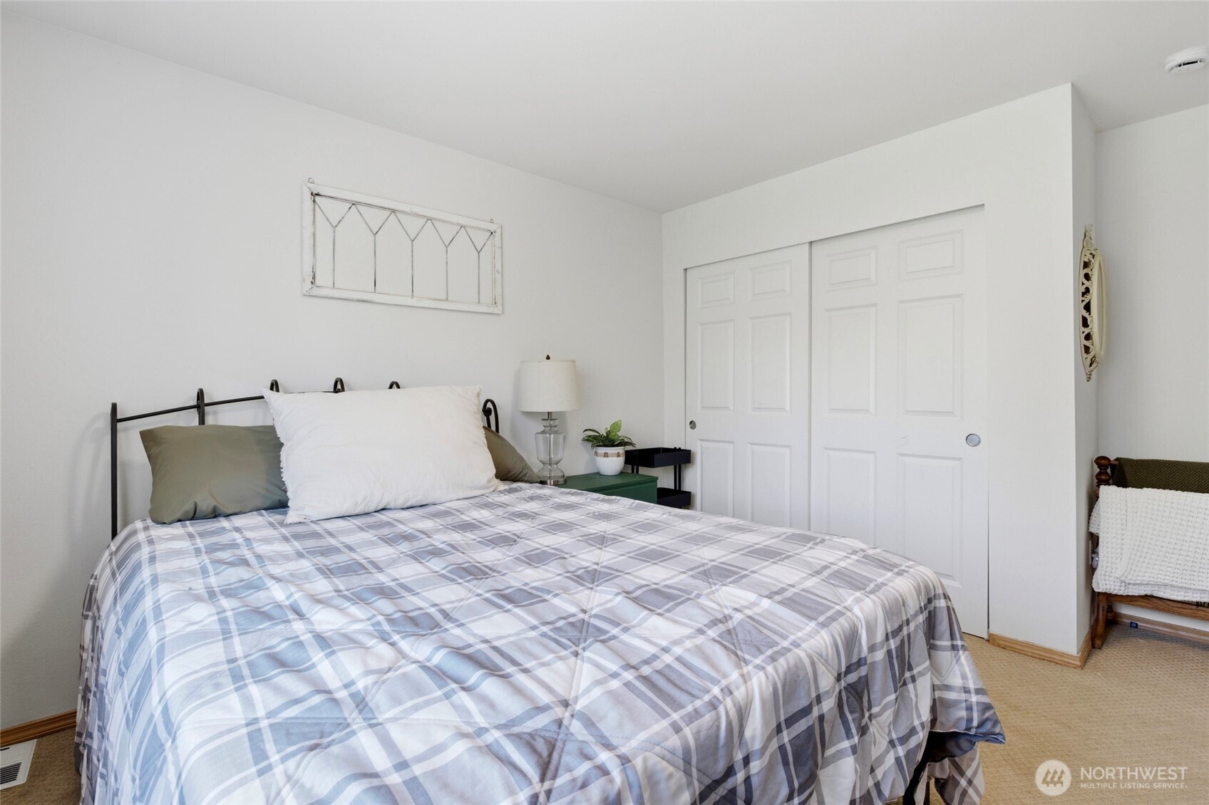 14005 Cedar Court Sultan, WA 98294 - Photo 24 of 38 a bedroom with a bed and a lamp