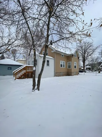 a house with trees in front of it