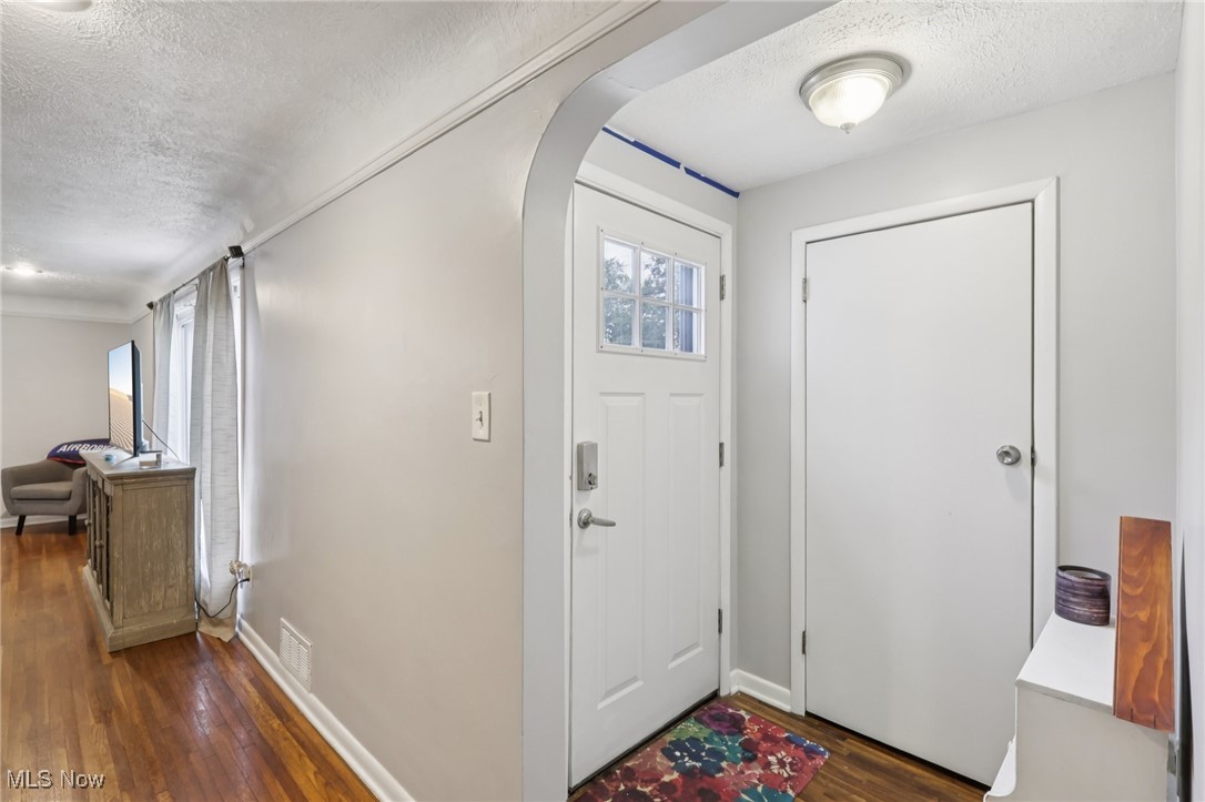 7180 Reynolds Road Mentor, OH 44060 - Photo 2 of 40 warm welcome entryway with coat closet and keyless entry