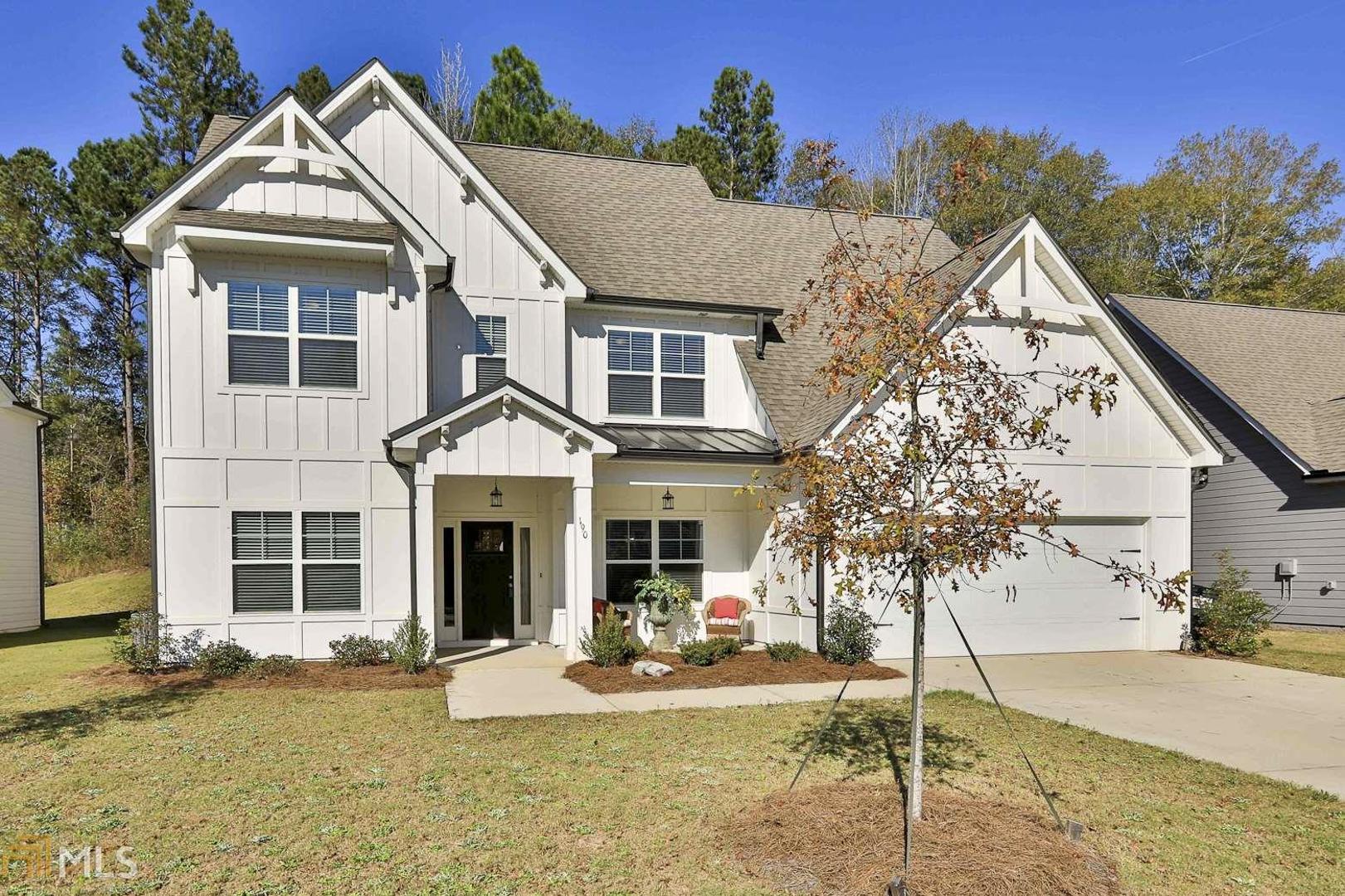 190 S Ridge Senoia, GA 30276 - Photo 1 of 1 a front view of a house with garden and trees