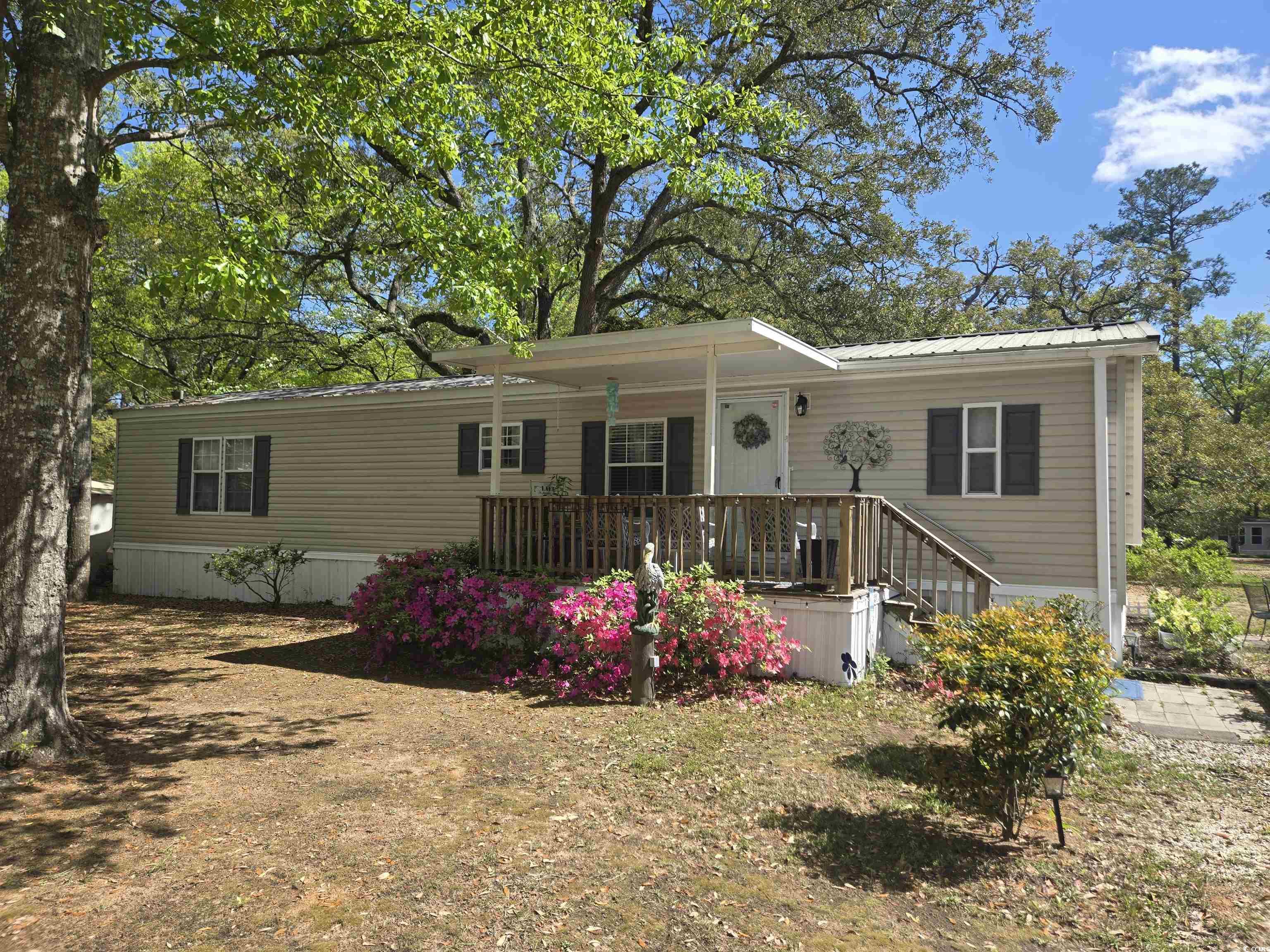 512 Porter Drive Murrells Inlet, SC 29576 - Photo 1 of 31 Manufactured / mobile home with metal roof and cov