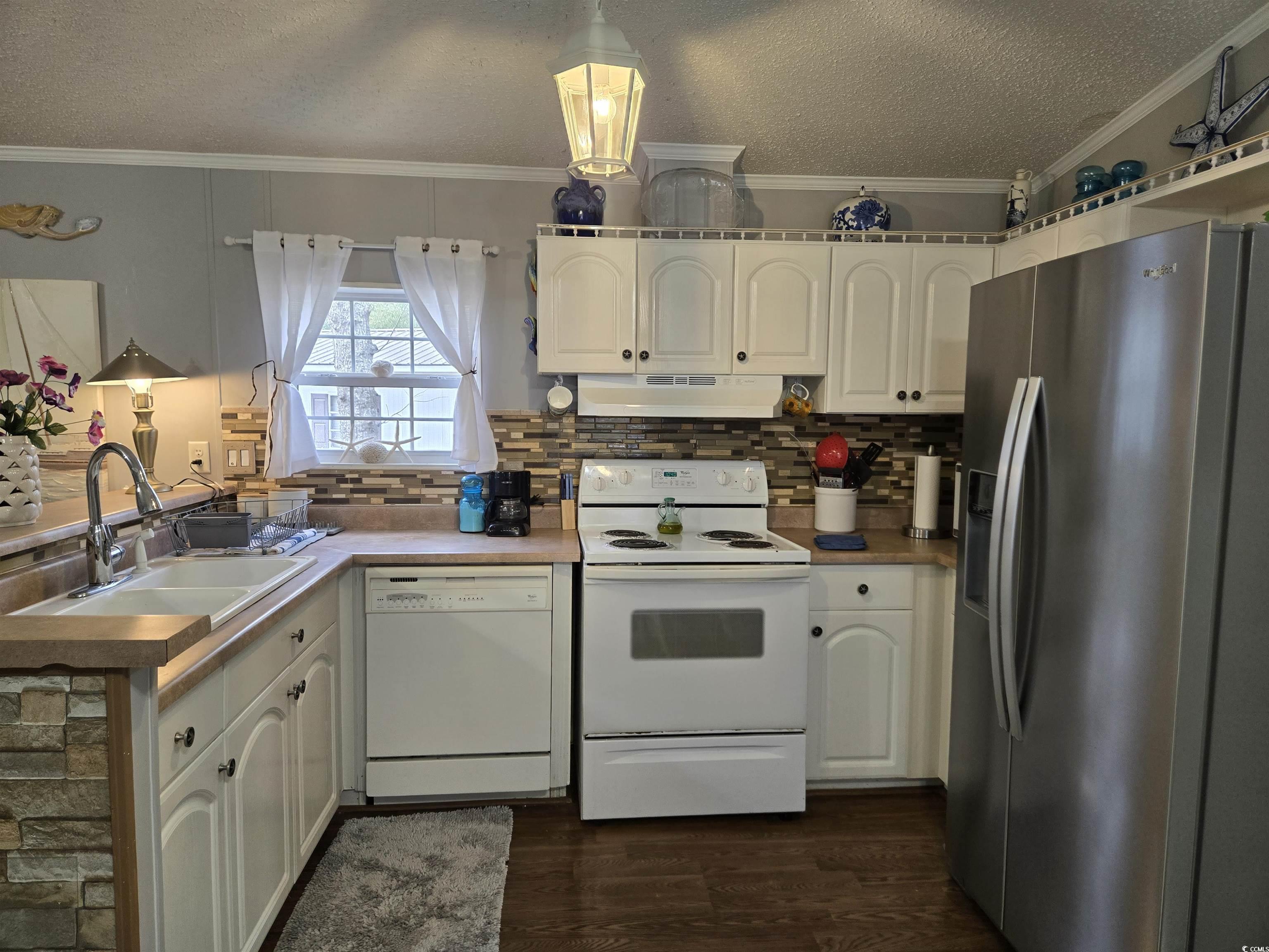 512 Porter Drive Murrells Inlet, SC 29576 - Photo 12 of 31 Kitchen featuring ornamental molding, under cabine