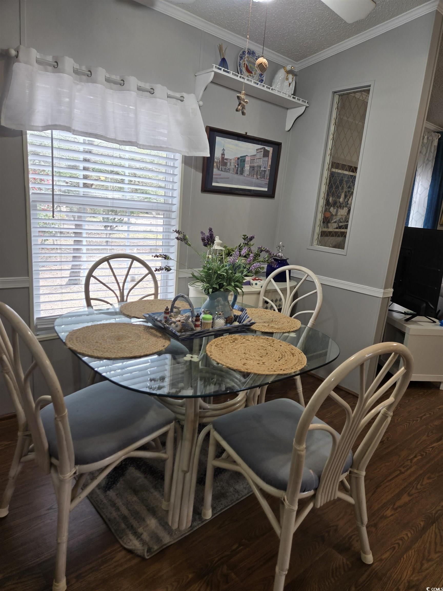 512 Porter Drive Murrells Inlet, SC 29576 - Photo 13 of 31 Dining area with a textured ceiling, wood finished