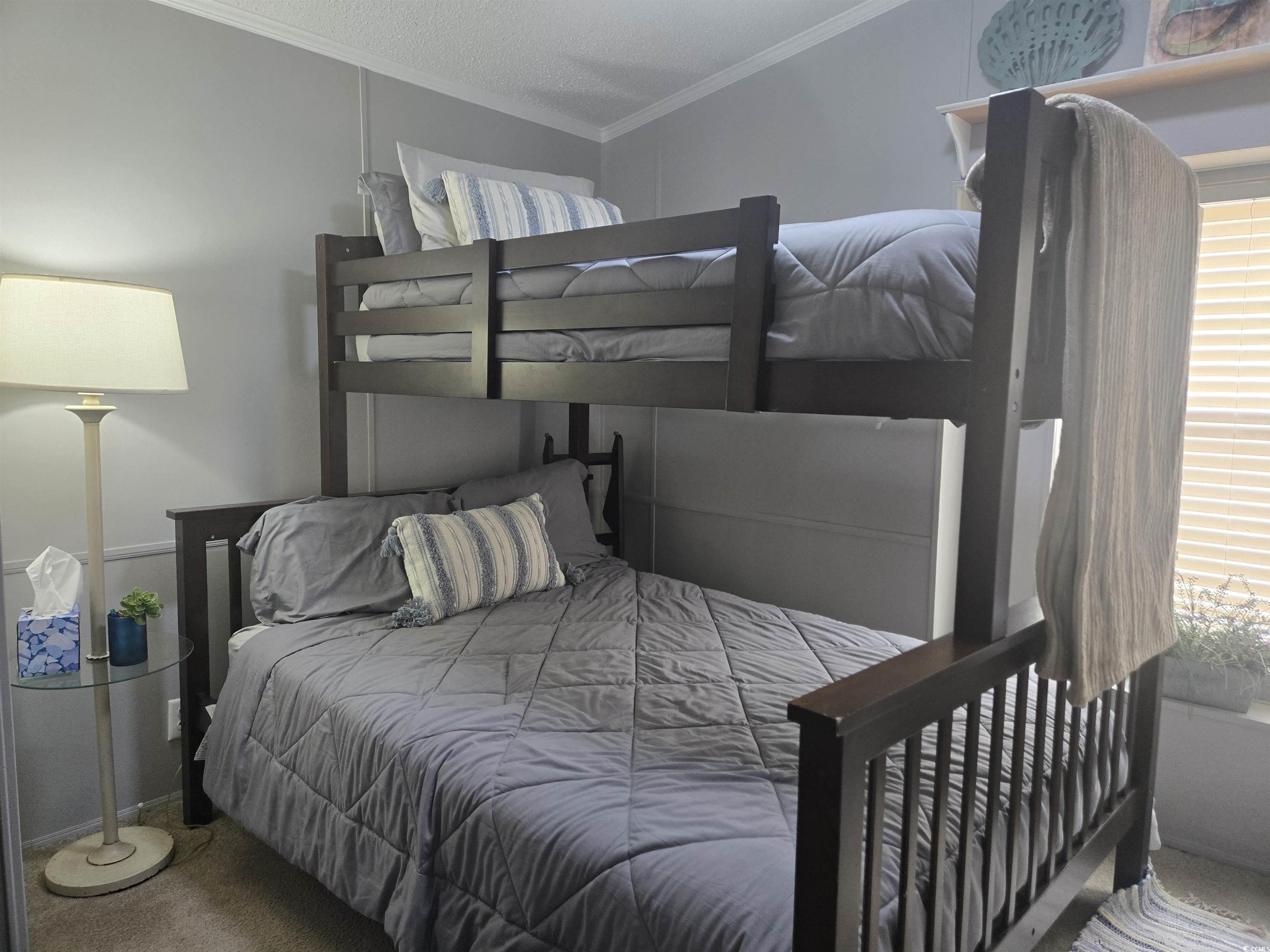 512 Porter Drive Murrells Inlet, SC 29576 - Photo 14 of 31 Carpeted bedroom with crown molding and multiple w