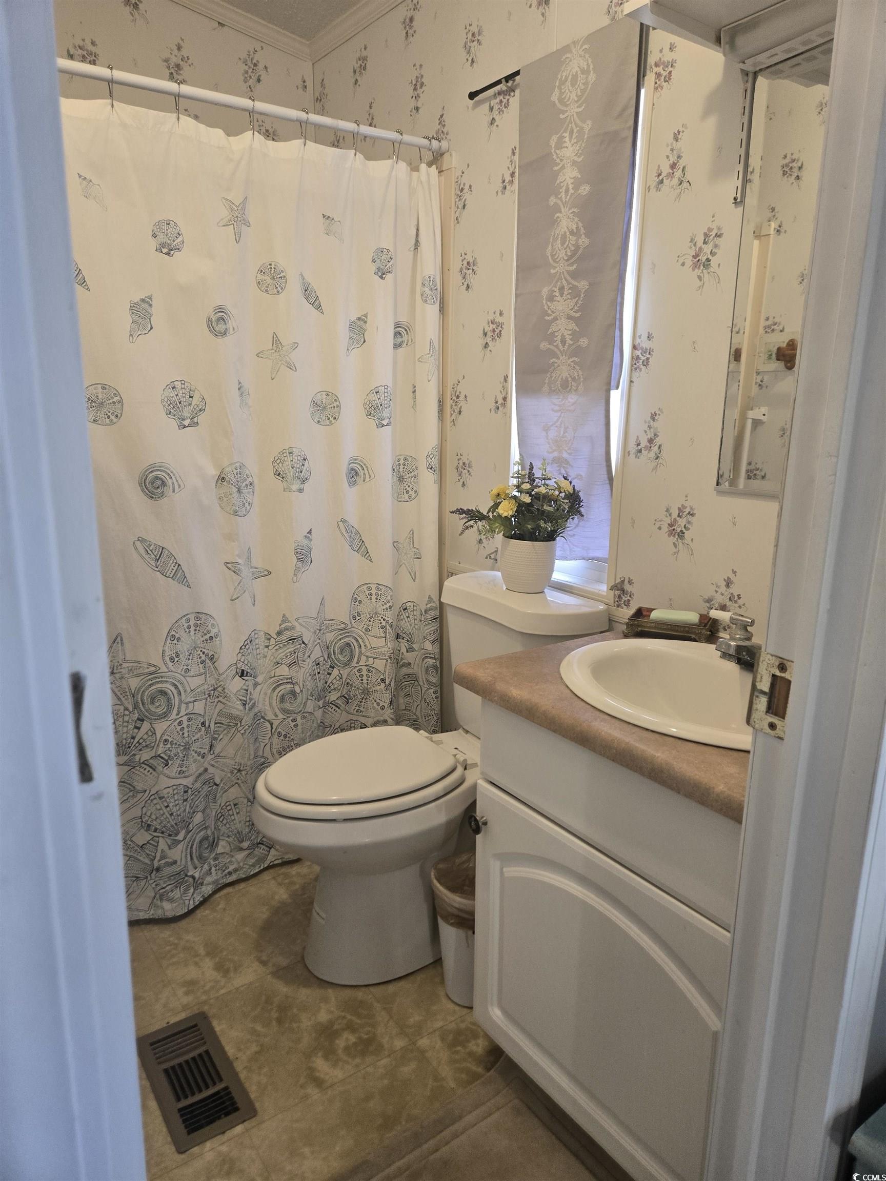 512 Porter Drive Murrells Inlet, SC 29576 - Photo 19 of 31 Full bathroom with vanity, visible vents, wallpape