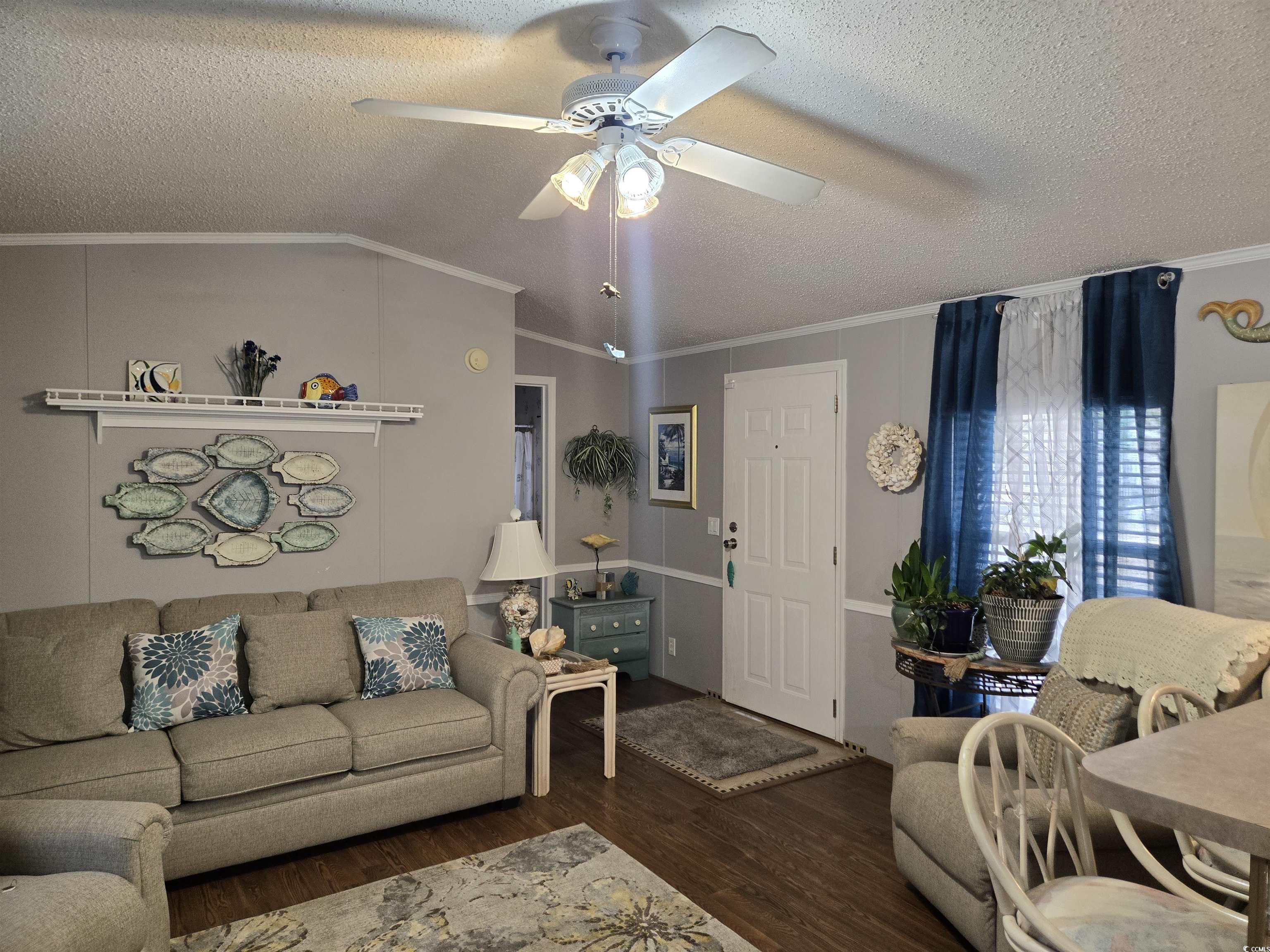 512 Porter Drive Murrells Inlet, SC 29576 - Photo 9 of 31 Living room with a textured ceiling, wood finished