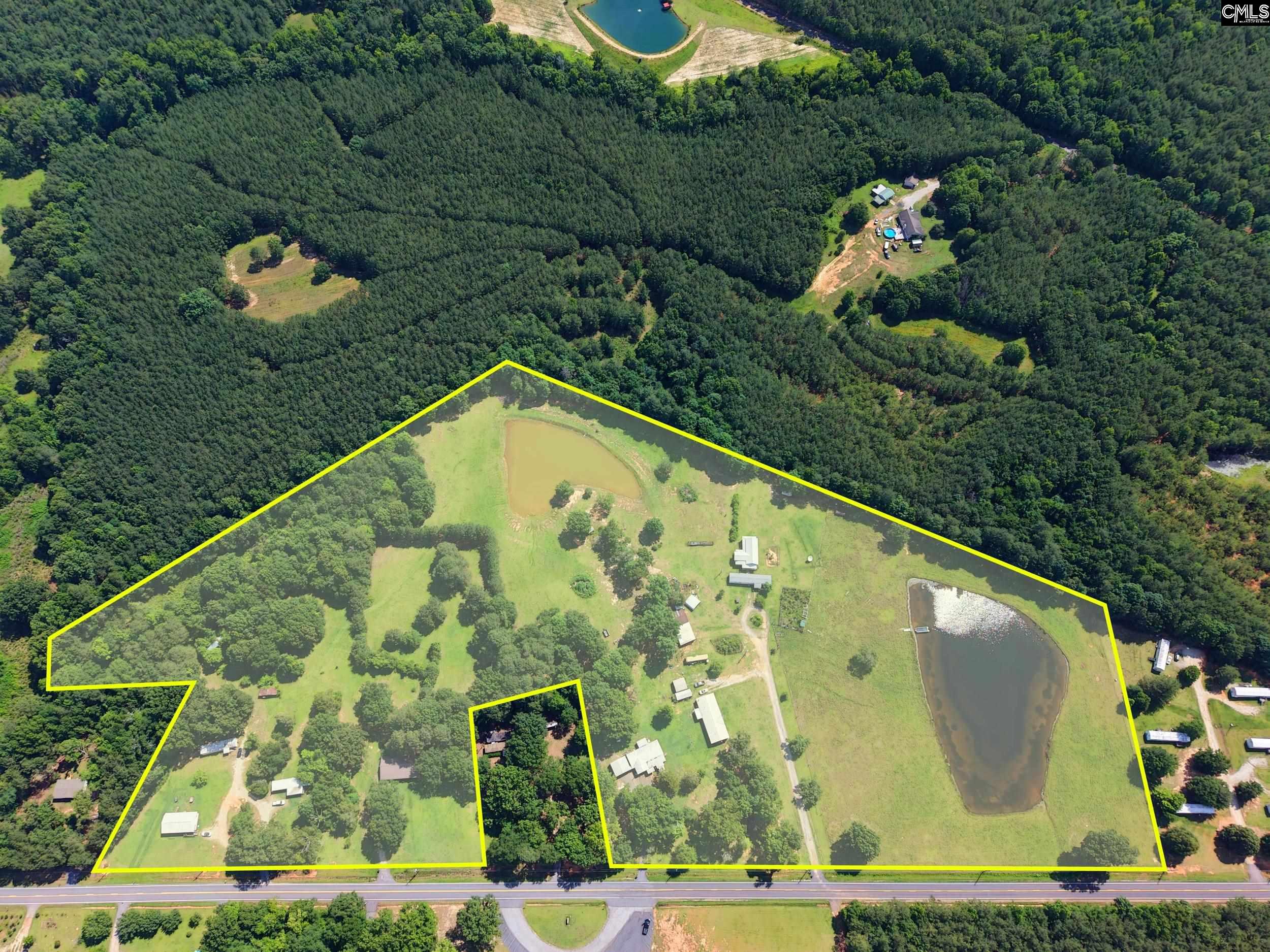 3140 Highway 702 Chappells, SC 29037 - Photo 1 of 39 an aerial view of swimming pool