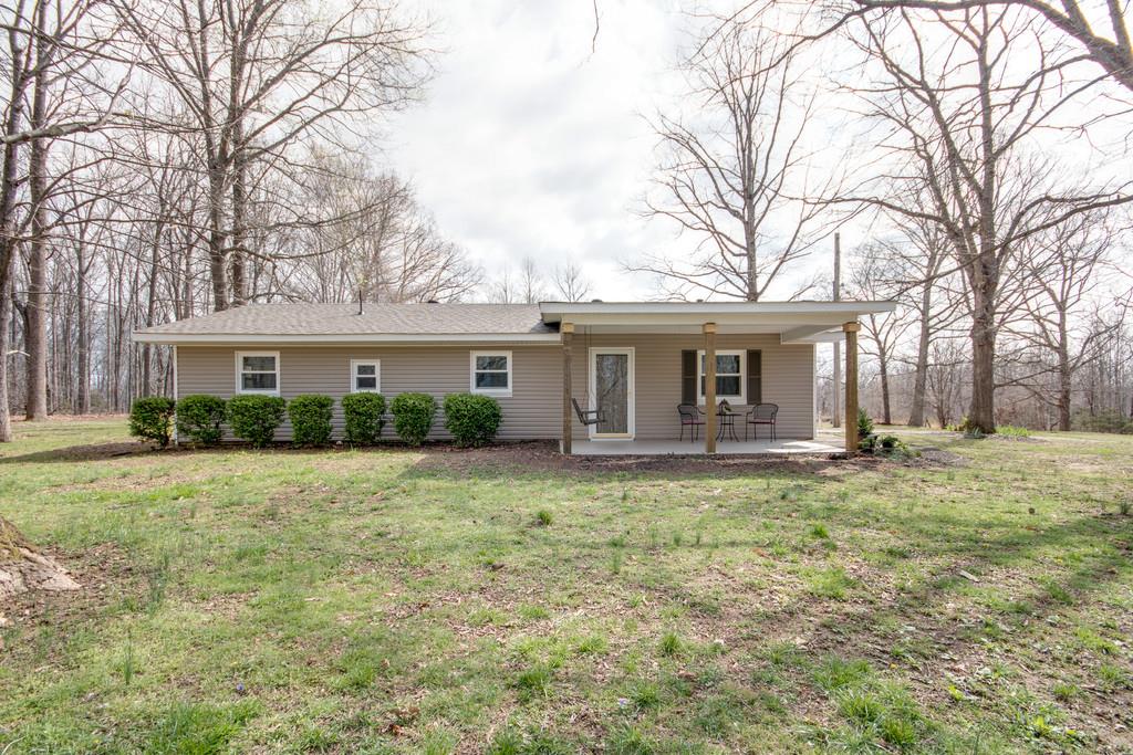 1020 Lambert Ridge Road Wartrace, TN 37183 - Photo 1 of 30 a front view of a house with a garden