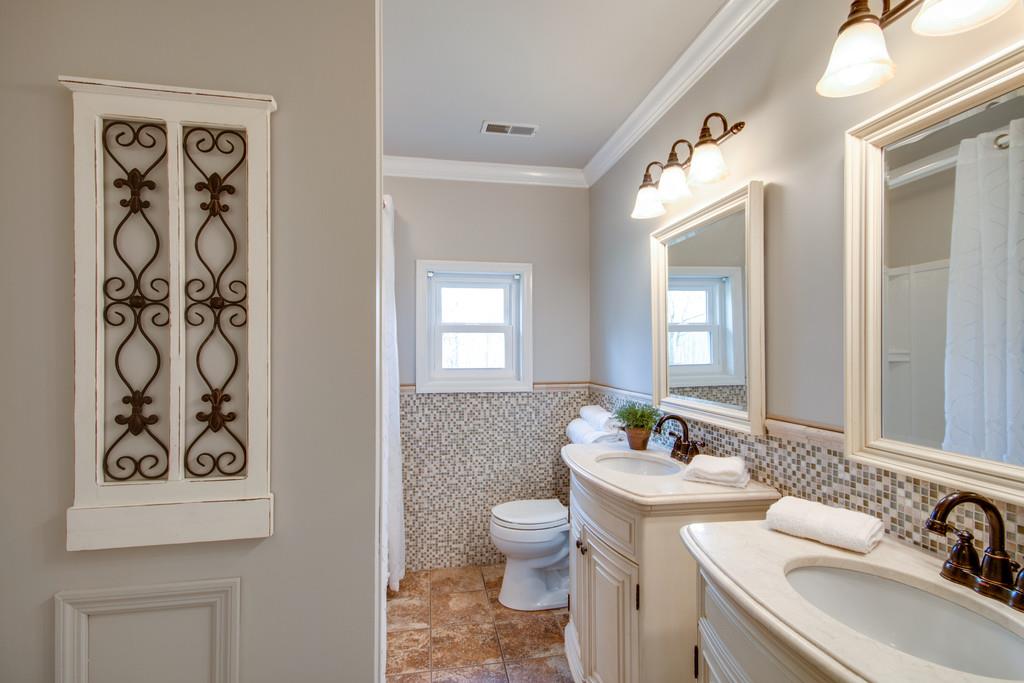 1020 Lambert Ridge Road Wartrace, TN 37183 - Photo 11 of 30 a bathroom with a toilet sink and mirror