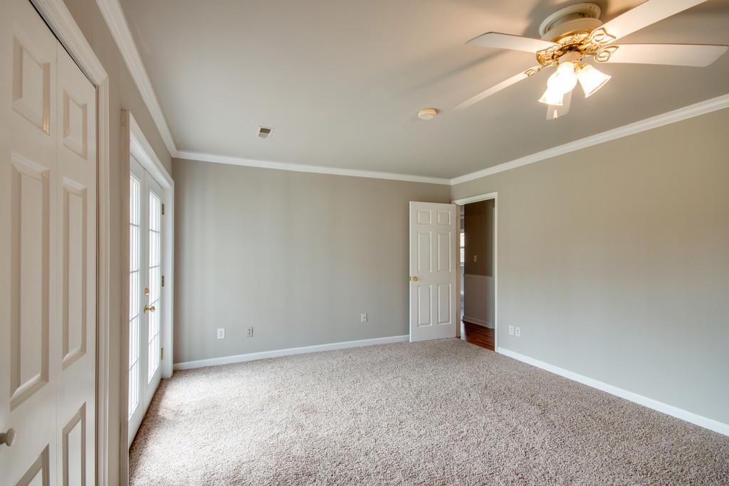 1020 Lambert Ridge Road Wartrace, TN 37183 - Photo 14 of 30 a view of a big room with windows and chandelier fan