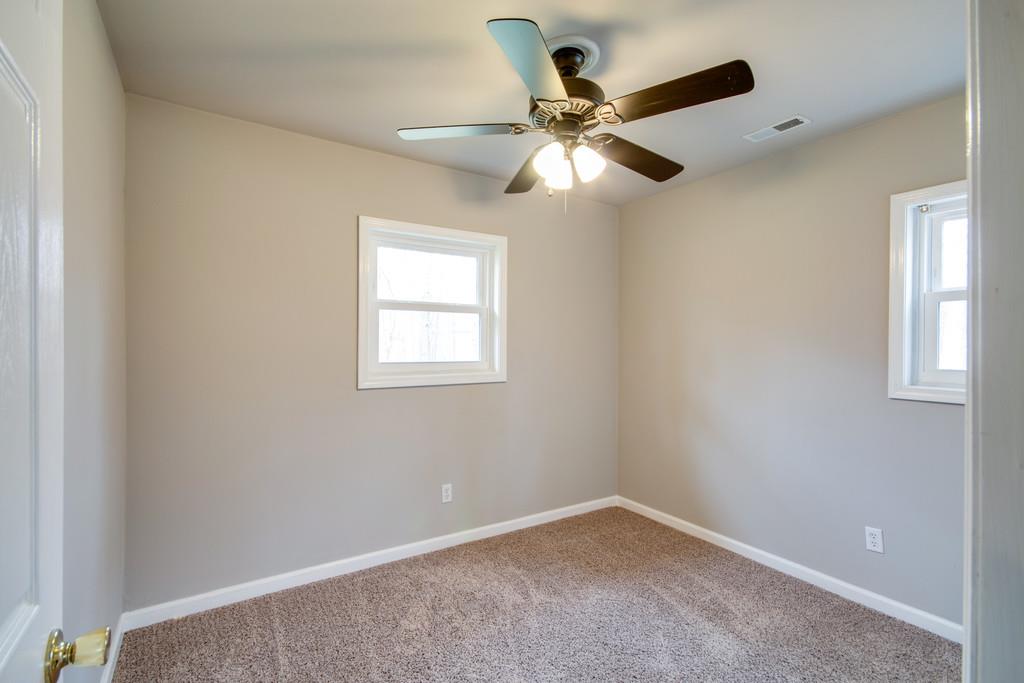 1020 Lambert Ridge Road Wartrace, TN 37183 - Photo 15 of 30 an empty room with a window and a fan