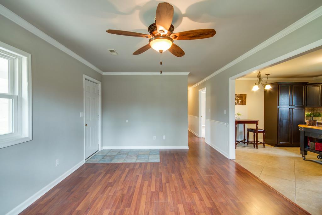 1020 Lambert Ridge Road Wartrace, TN 37183 - Photo 19 of 30 a view of livingroom with hardwood floor and ceiling fan