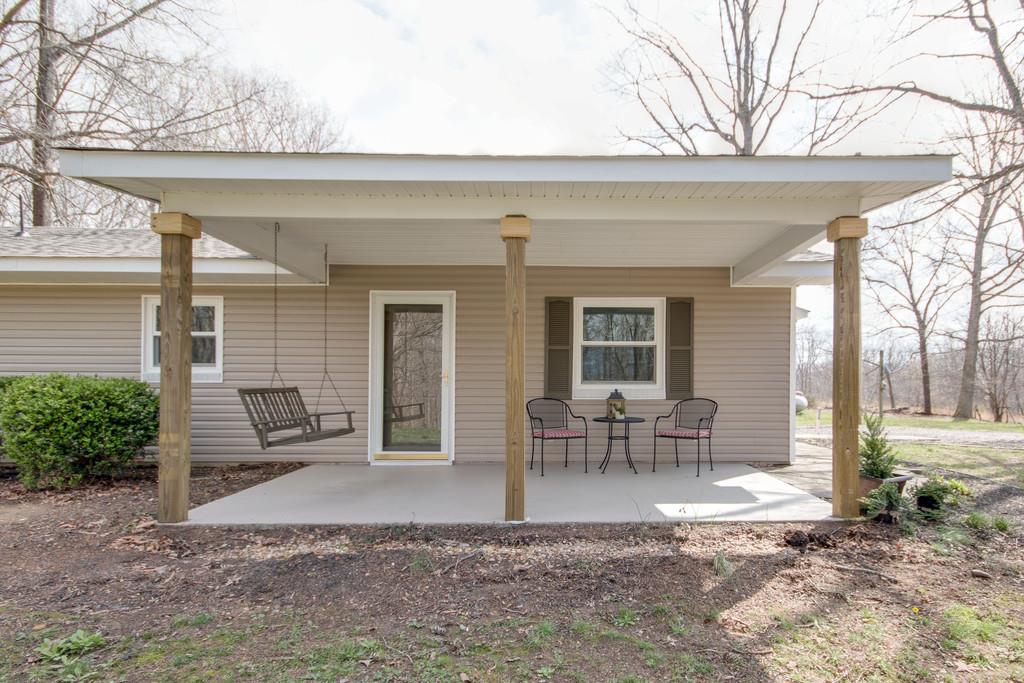 1020 Lambert Ridge Road Wartrace, TN 37183 - Photo 3 of 30 a view of a house with backyard and sitting area