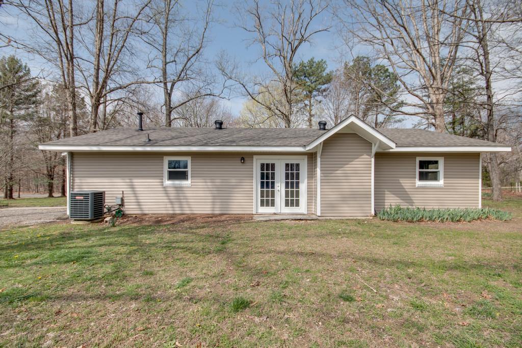 1020 Lambert Ridge Road Wartrace, TN 37183 - Photo 21 of 30 a view of a yard in front of a house with large tree