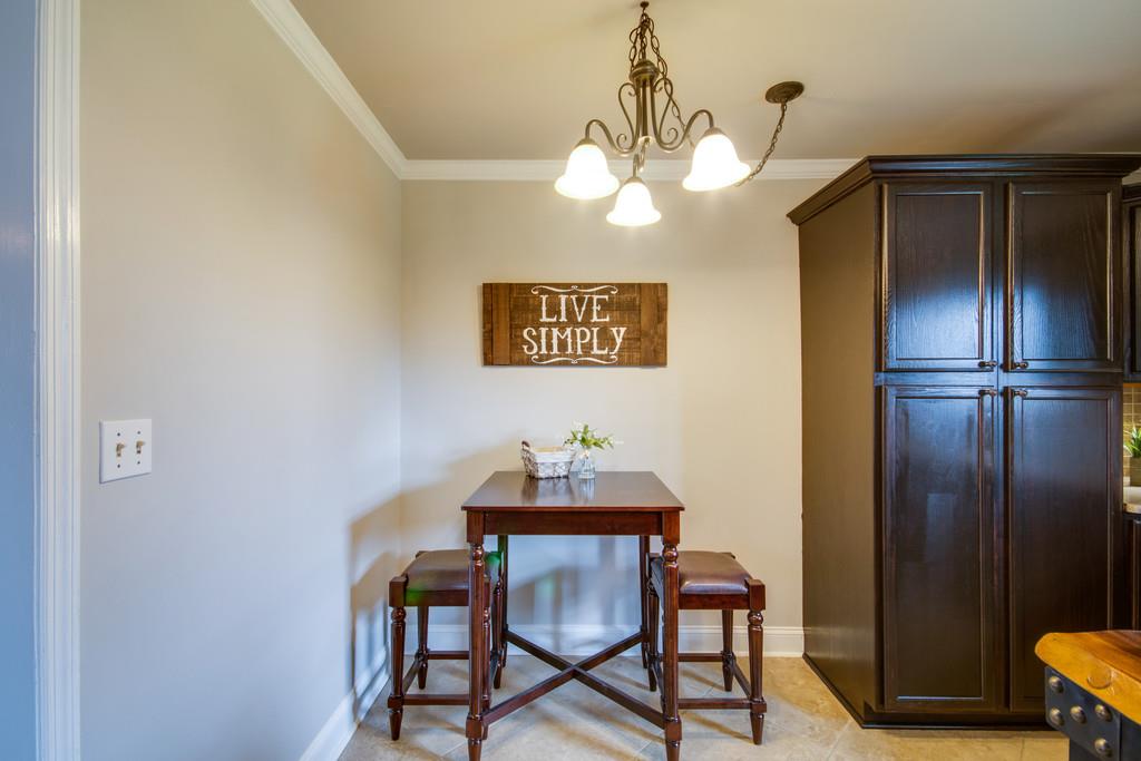 1020 Lambert Ridge Road Wartrace, TN 37183 - Photo 5 of 30 a view of a dining room with furniture and chandelier