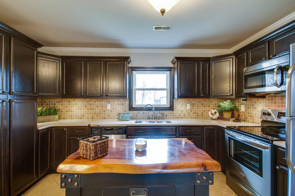 1020 Lambert Ridge Road Wartrace, TN 37183 - Photo 6 of 30 a kitchen with a sink and cabinets
