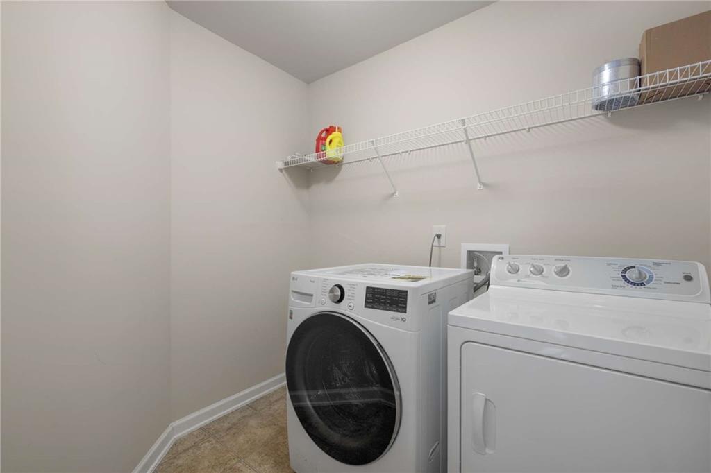 3084 Turman Circle Decatur, GA 30033 - Photo 17 of 36 a utility room with dryer and washer