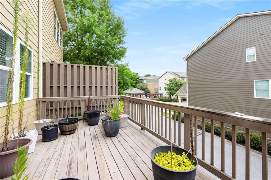 3084 Turman Circle Decatur, GA 30033 - Photo 27 of 36 a view of a deck with furniture and wooden floor