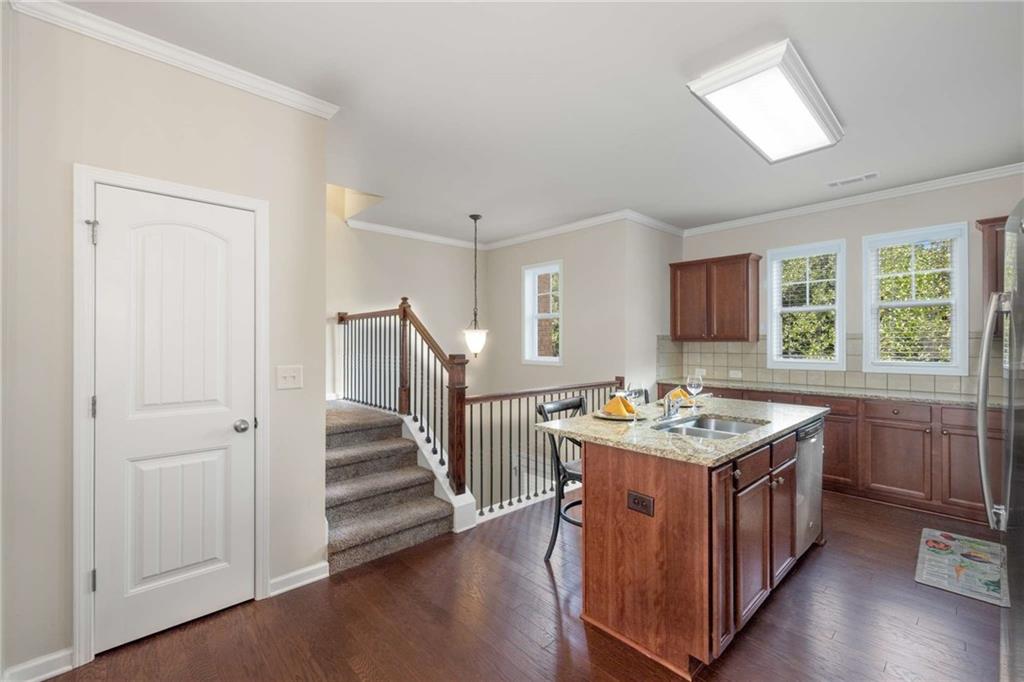 3084 Turman Circle Decatur, GA 30033 - Photo 6 of 36 a kitchen with a stove a sink and a refrigerator